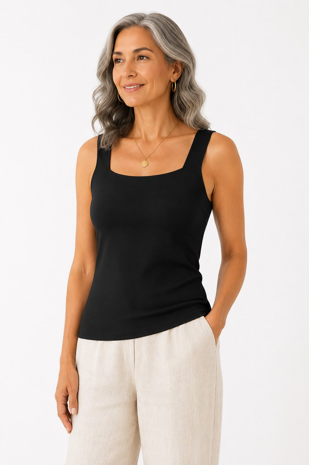 Woman wearing the Faye Built-In Support Tank in Black