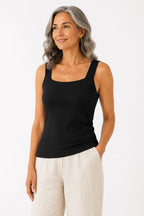 Woman wearing the Faye Built-In Support Tank in Black