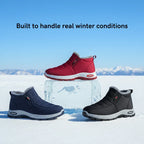 Sianna ankle boots in red, navy and black standing on snow