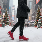 Woman walking through snow wearing the Sianna boots in red