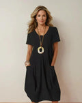Kwani Flow Dress in black, detail view – Golden Hour Wardrobe