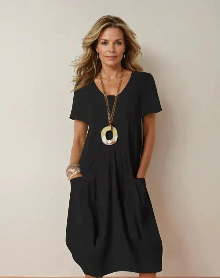 Kwani Flow Dress in black, detail view – Golden Hour Wardrobe